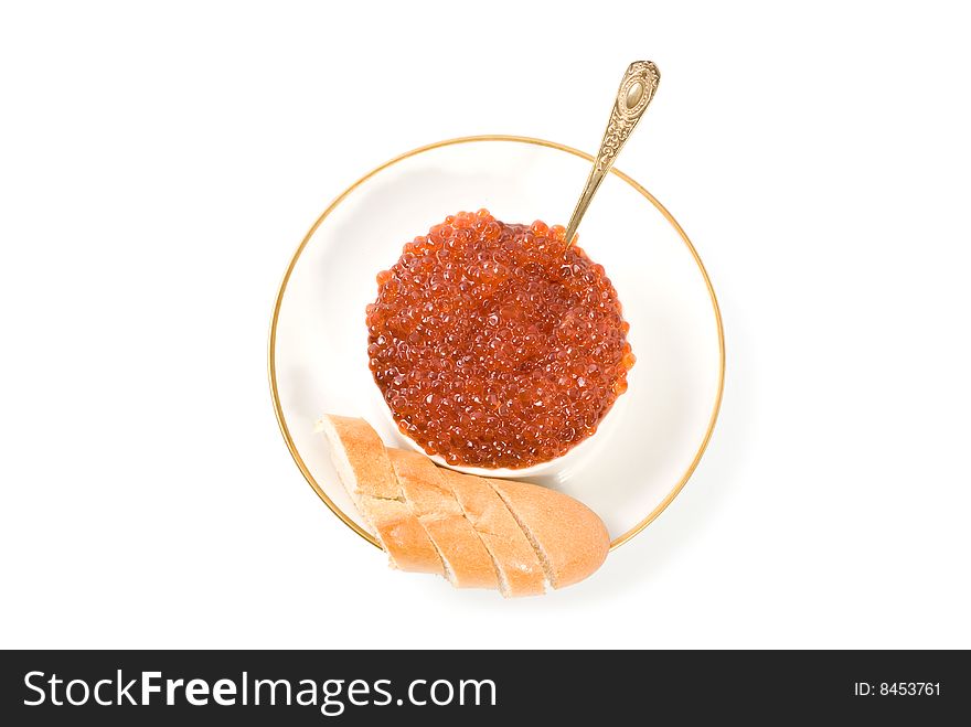 a dish with red caviar isolated on white