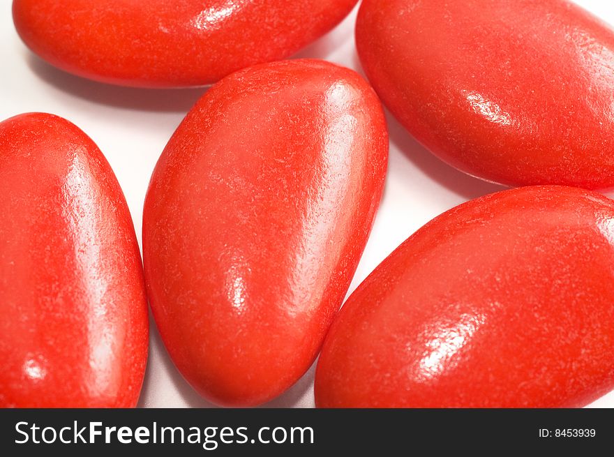 Macro shot of red sugared almonds