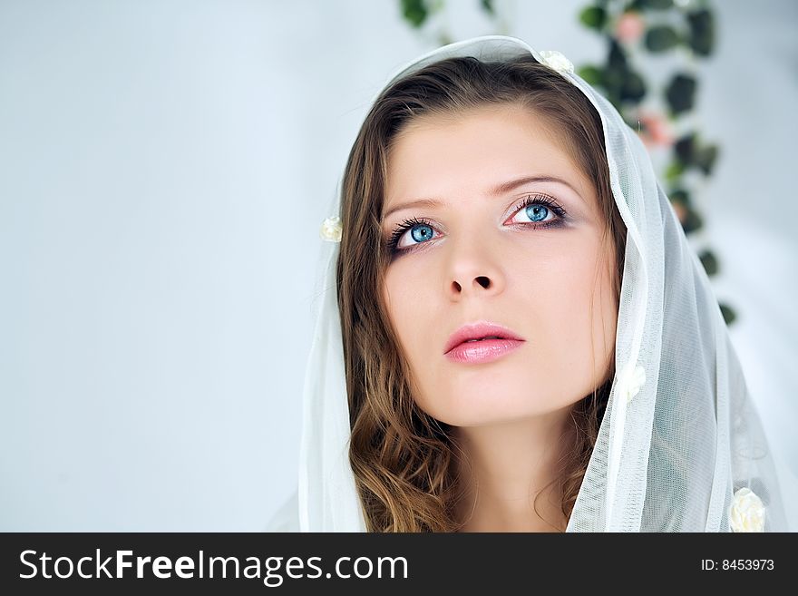 Portrait of beautiful woman in the shawl. Portrait of beautiful woman in the shawl.