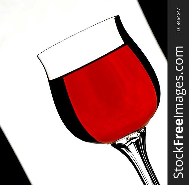 A glass of red wine, on a white background