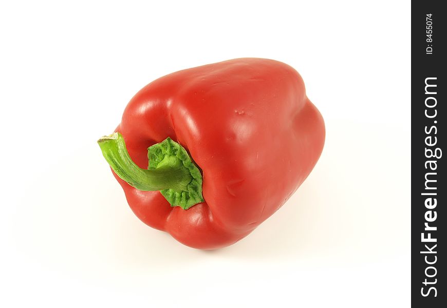 Red pepper on white isolated background.