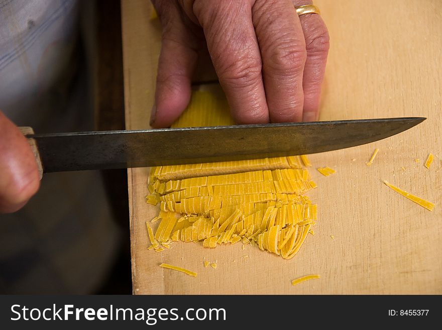 Making pasta, old hands at work