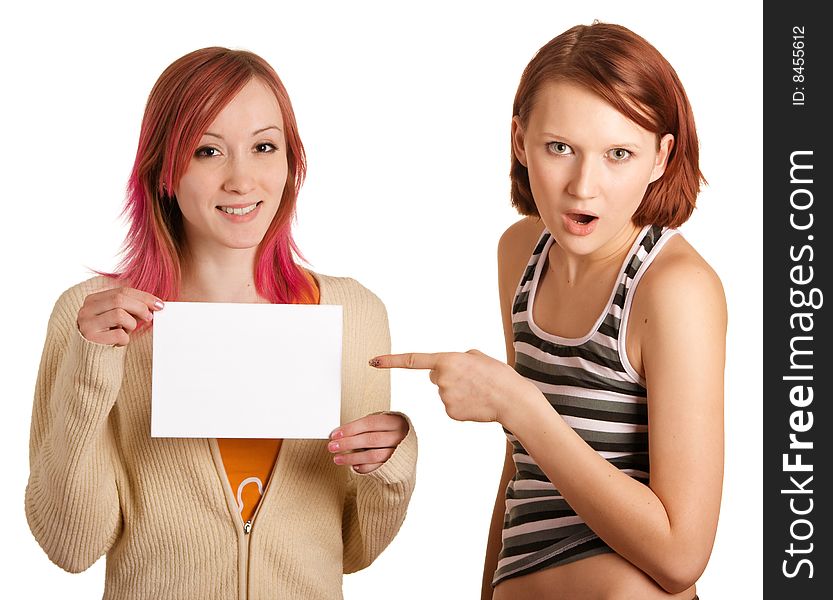 Girls with a sheet of paper and strong surprise on the faces. Girls with a sheet of paper and strong surprise on the faces