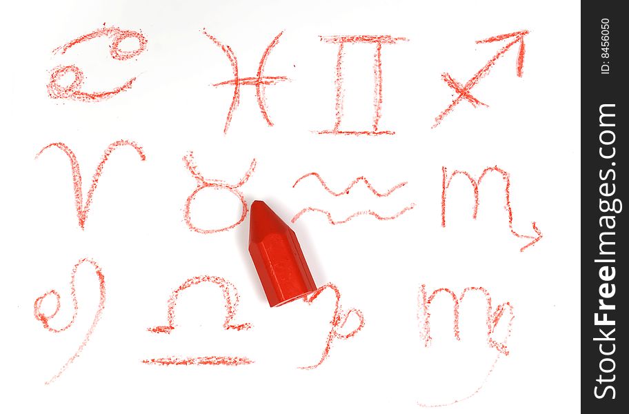 Zodiac signs with red wax crayon on white