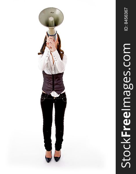 Front view of female carrying loudspeaker on an isolated background