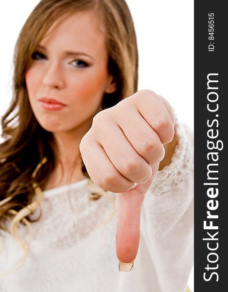 Portrait of young woman with thumbsup on an isolated background