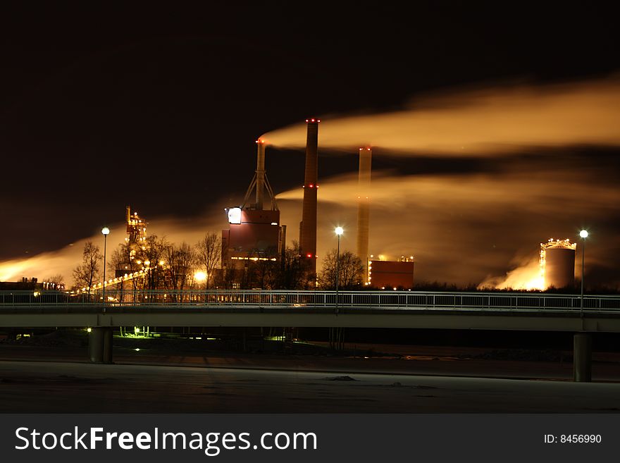 Factory smoke at night with long exposure effect