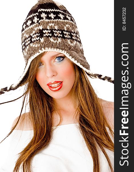 Front view of woman wearing woolen cap on an isolated background