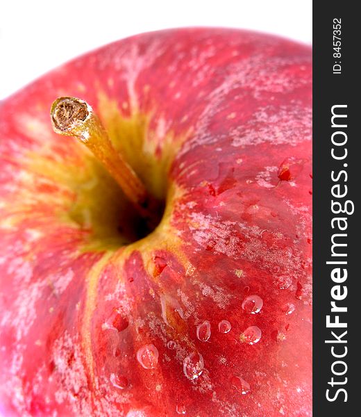 Detail of red apple with water droplets on the surface