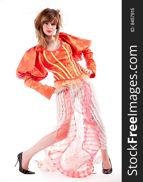 Cute Teenage Girl In An Orange Fancy Dress Posing