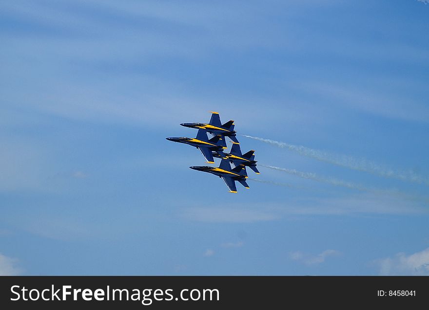 Blue Angels flying in tight Diamond formation