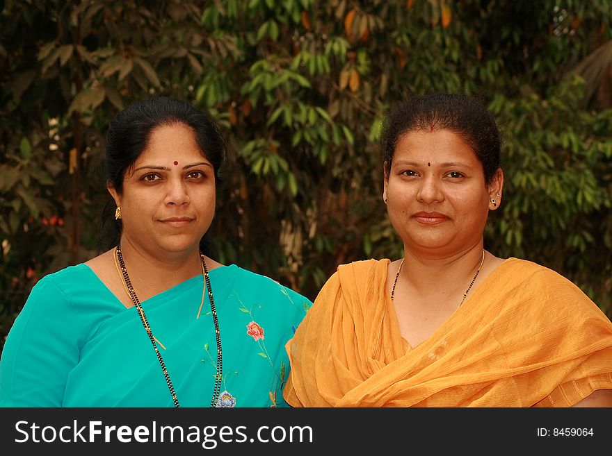 A portrait of a two smart Indian women. A portrait of a two smart Indian women.