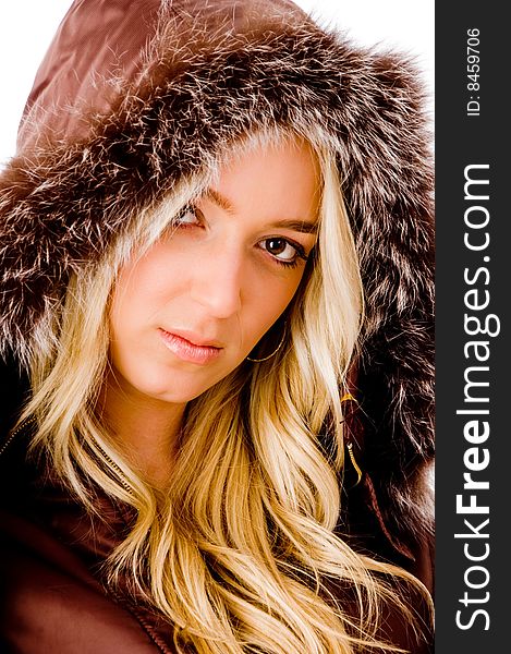 Portrait of beautiful young female looking at camera on an isolated white background