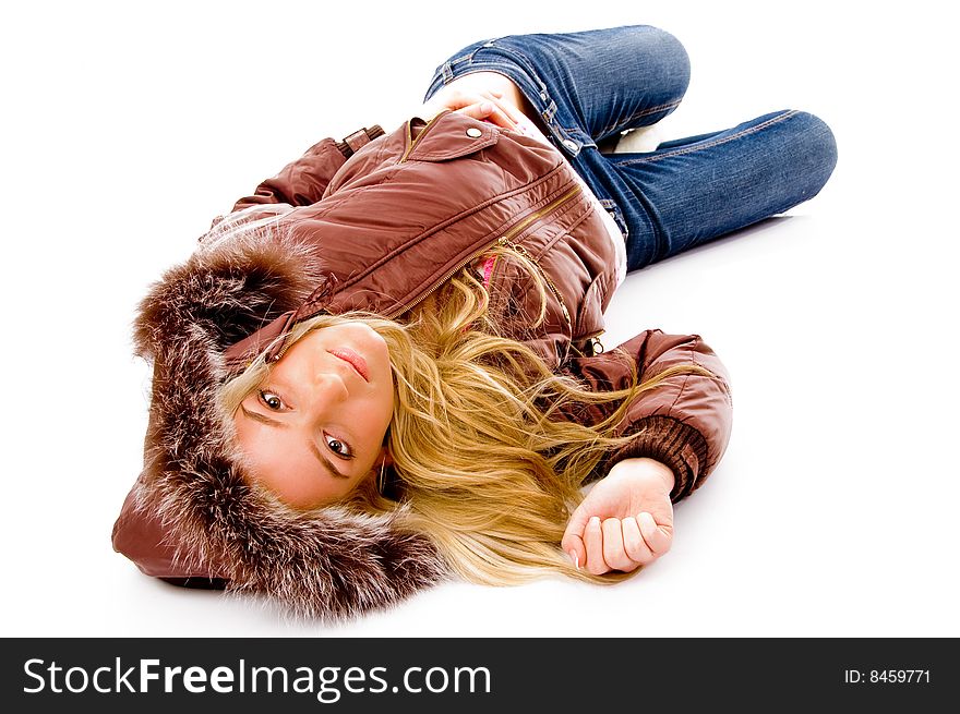 Side view of resting beautiful woman looking at camera on an isolated white background