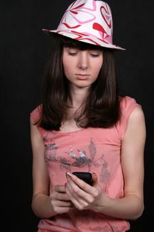 Girl With A Phone Royalty Free Stock Photos