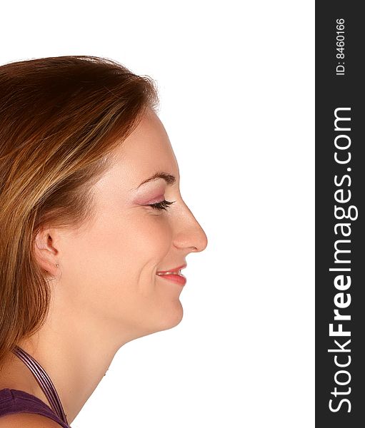 Young female with pink makeup turned sideways profile. Young female with pink makeup turned sideways profile