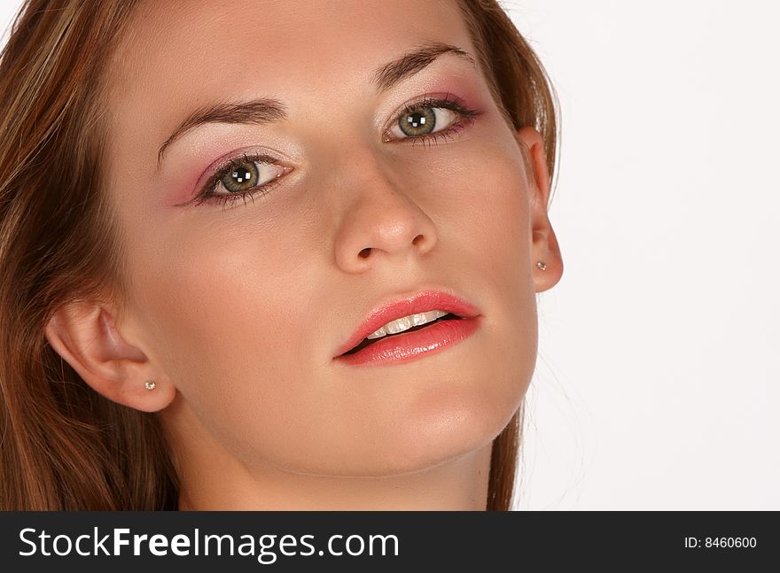 Brunette with long hair and pink eye shadow