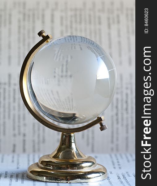 Glass globe statuette representing globalization