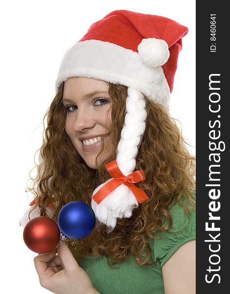 Christmas, red haired teenager with decoration, Christmas tree ball and Christmas hood