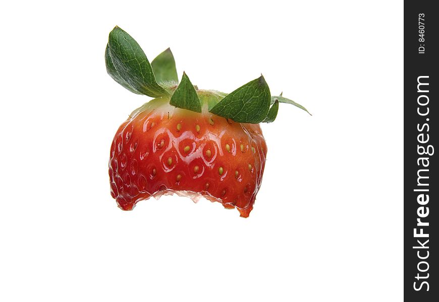One Organic partially eaten Strawberry isolated on white background.