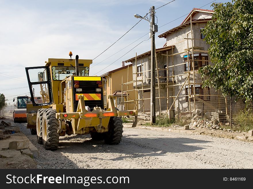 Big yellow bulldozer at a construction site
