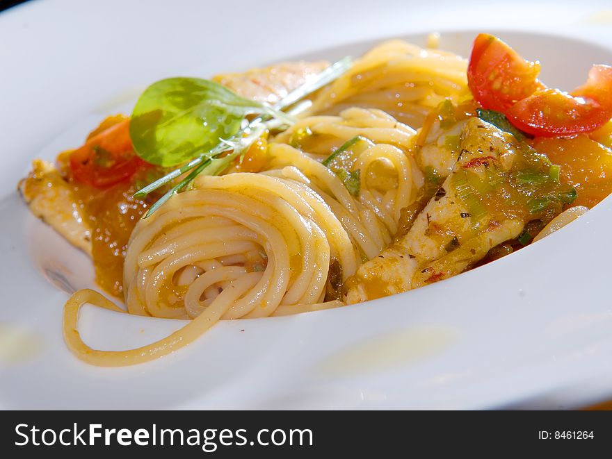 Spaghetti with vegetables in white ware