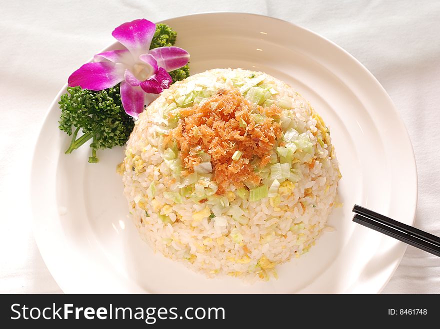 Chinese fried rice with salmon, egg, cabbage, scallion.