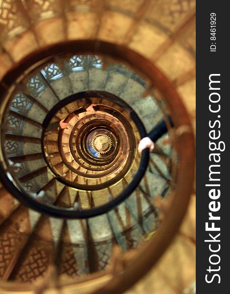 A deep spiral staircase in Paris. A deep spiral staircase in Paris