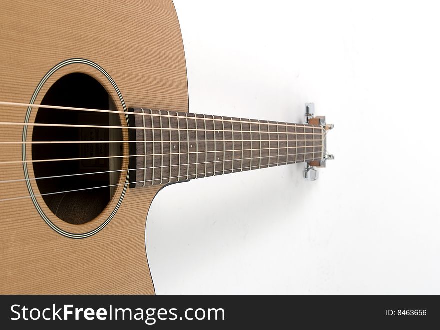 Classical guitar on white background