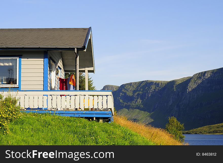 Small cabin by a mountain lake in Norway. Small cabin by a mountain lake in Norway