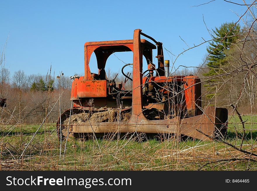 Old farm equipment, antique plow, bob cat. vintage