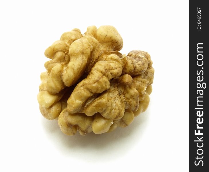 Kernels of walnuts on white background. Photo was converted from RAW format.