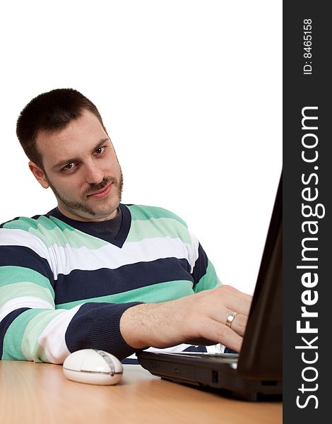 Man chilling on a job in front of his notebook