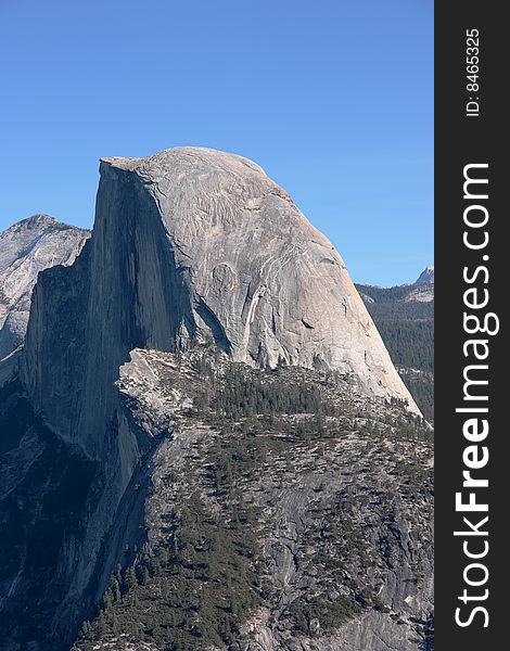 Huge and impressive granite crest considered the symbol of the Yosemite National Park, California (USA). Huge and impressive granite crest considered the symbol of the Yosemite National Park, California (USA)