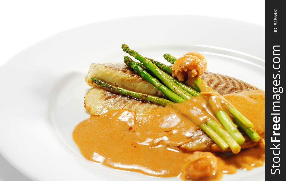 Sea Bass Fillet with Tomato Sauce and Fresh Asparagus