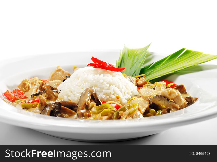 Braised Chicken Slice with Mushrooms and Rice Heap and Spring Onions. Isolated on White Background