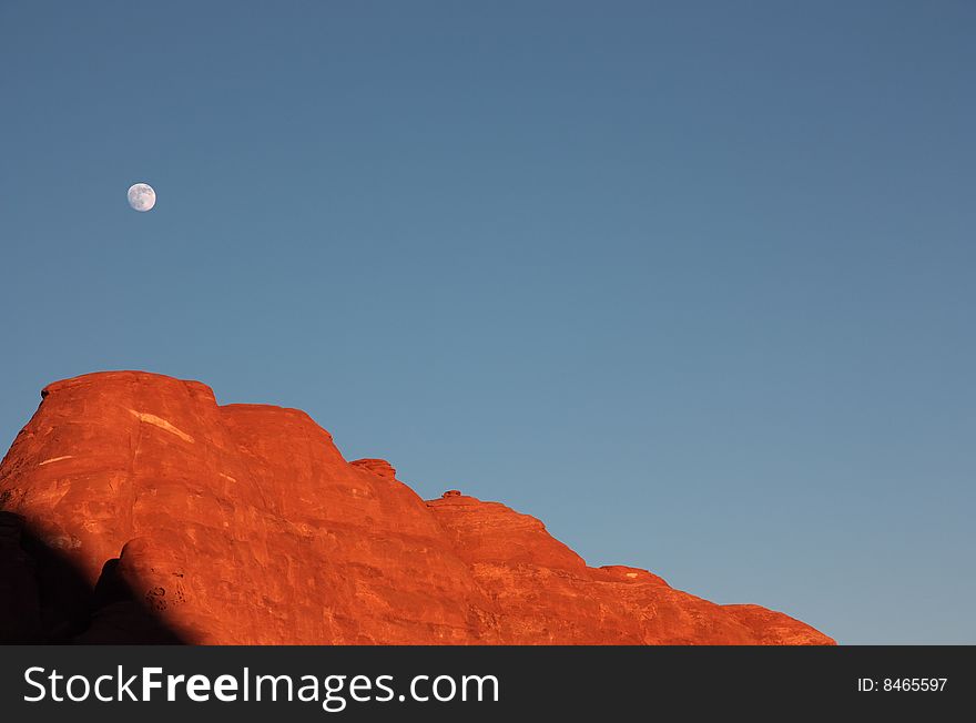 Sunset And Moonrise In The Arches National Park