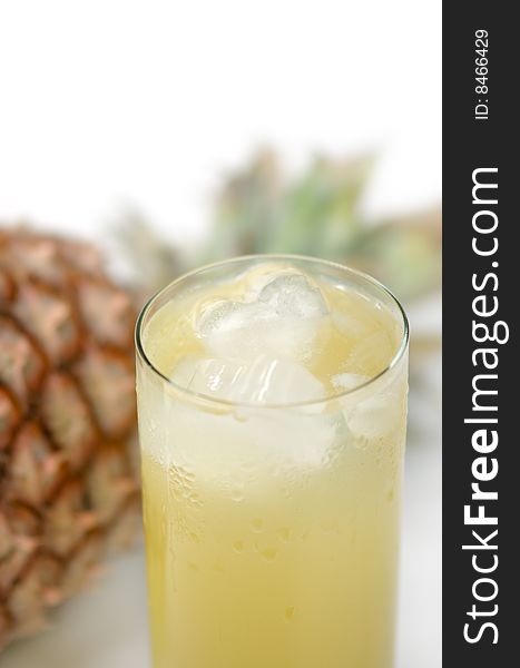 Pineapple and juice of pineapple with an ice