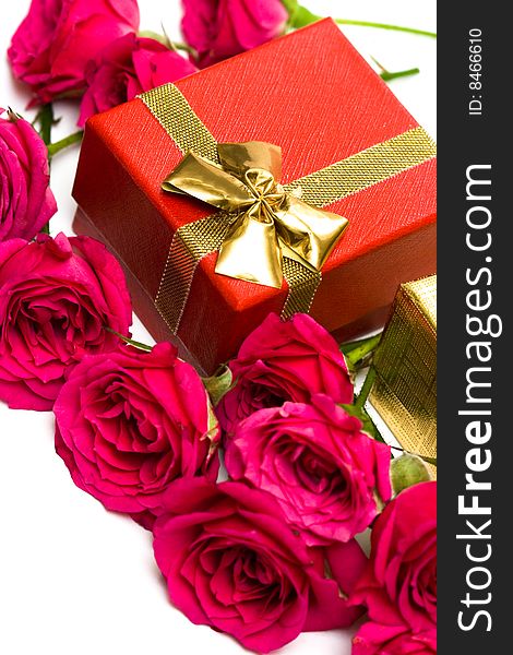 Red gift box with pink roses