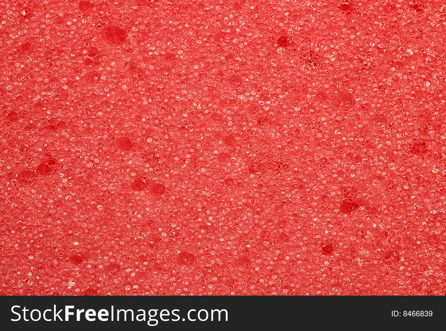 Macro shot of a red sponge texture