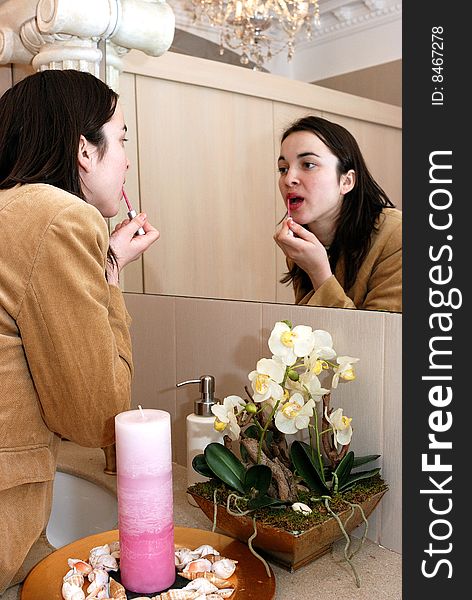 Young woman in front of a mirror