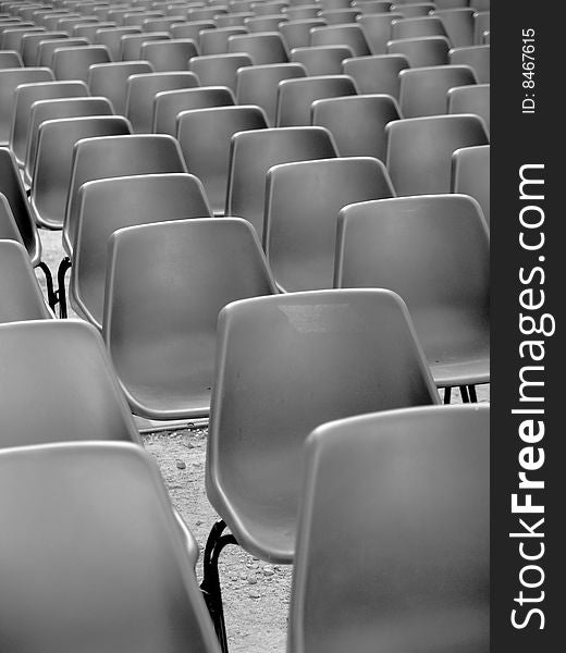 A beautiful monochrome of a lot of chairs