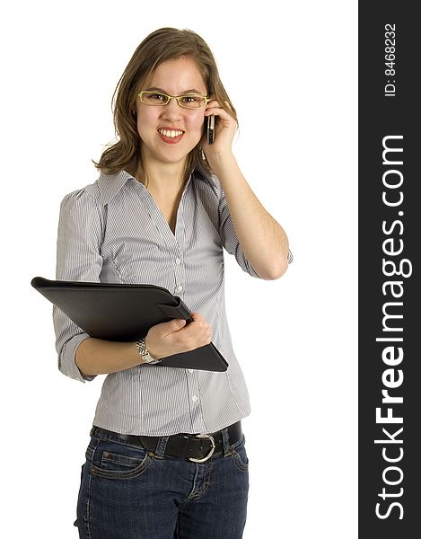 Businesswoman talking into a mobile phone on white