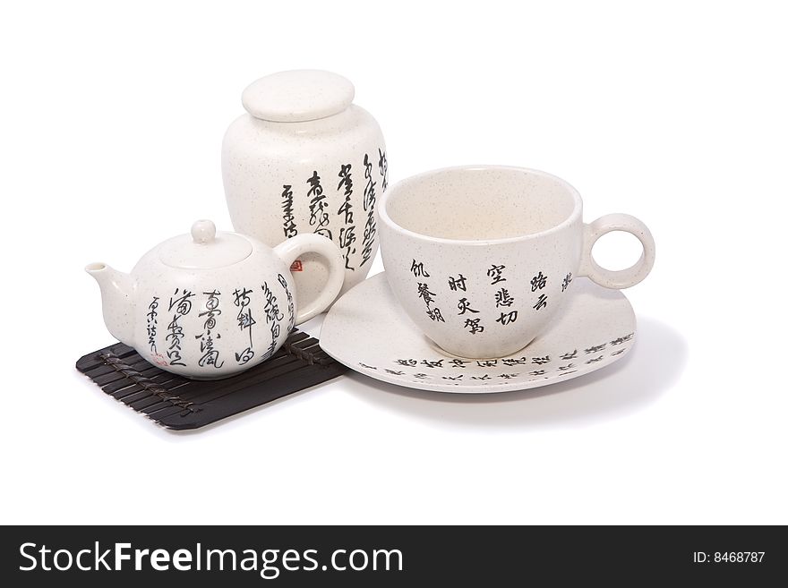 Tea-things in asian style with hieroglyphics