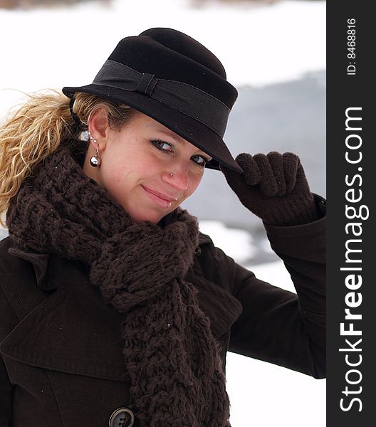 Curly girl with brown hat