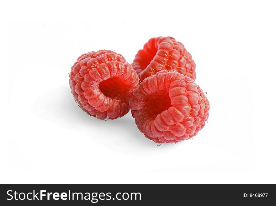 Three fresh Raspberries isolated on white background. Three fresh Raspberries isolated on white background