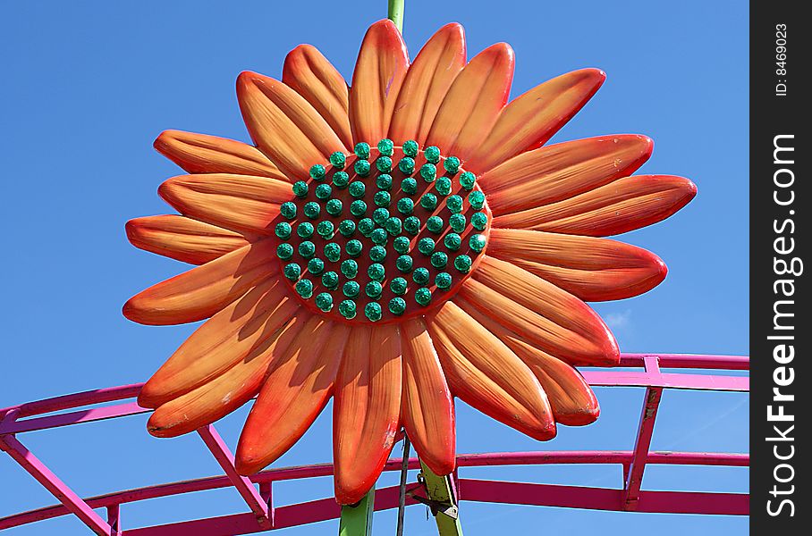 Image of a decorative detail on a thrill ride at the Strawberry festival in Plant City, FL. Image of a decorative detail on a thrill ride at the Strawberry festival in Plant City, FL.