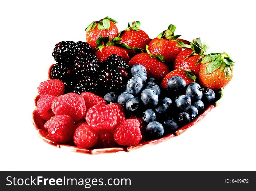 An image of a berry mix in a bowl. An image of a berry mix in a bowl