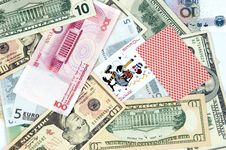 Different Banknotes And Joker Card Royalty Free Stock Images Different Banknotes And Joker Card Royalty Free Stock Images