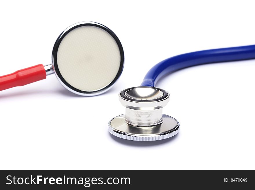 Red and blue stethoscope isolated in white background